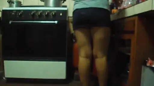 Mother caught in the kitchen