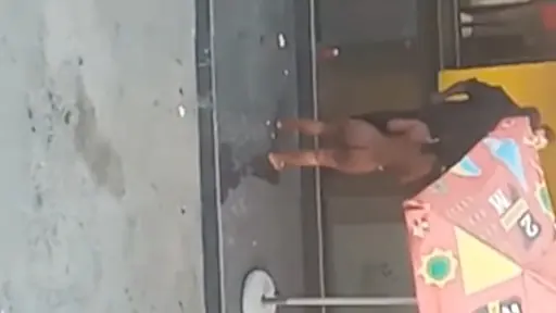 Freak completely naked in the street