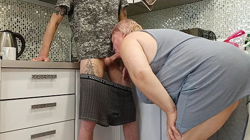 My Fat Mom Drops To Her Knees In The Kitchen And Sucks My Dick Until I Blast Down Her Throat