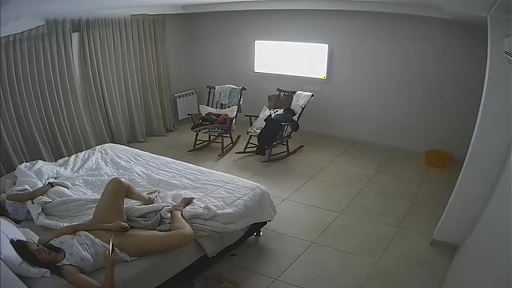 IPTV catches hot mom spread on her bed secretly fingering her cunt while watching TV