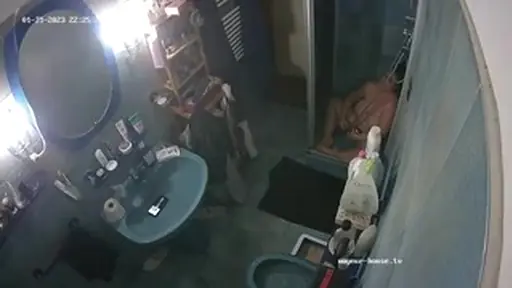 Peeping through the bathroom crack watching my mom in the shower making herself cum on camera